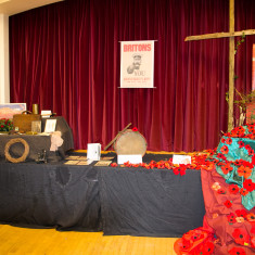 Central display: hand sewn poppies with a rustic cross | Alan McDermott